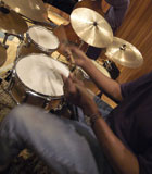 Playing+a+Drum+Kit