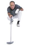 Golfer+lining+up+putt