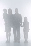 Silhouette+of+family+behind+screen