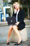 Businesswoman+using+laptop+computer