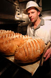 man+baking+bread