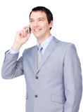 Smiling,businessman,on,phone,