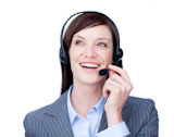 Portrait of a young customer ӥ agent with headset on