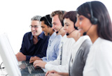 Confident business people using headset