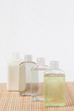 Four massage oil bottles