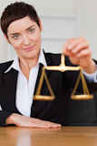 Woman holding the justice scale
