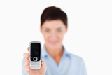 Close up of a woman showing a cellphone