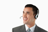 Close up of young male professional with headset on