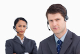 Close up of serious looking call center agents