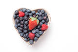 Berries,in,a,heart,shaped,bowl,with,white,yogurt