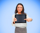 Businesswoman holding a tablet PC with cloud symbol