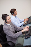 Happy call center employees at work