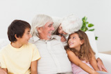 Grandparents with grandchildren chatting