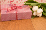 Pink,wrapped,present,with,mothers,day,card