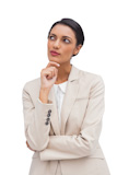 Worried young businesswoman holding her head