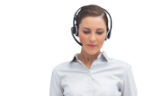 Businesswoman listening to caller on headset