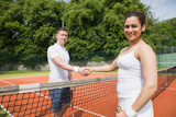 Tennis opponents shaking hands before match