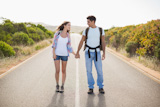 Couple standing on countryside road