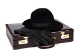 Suitcase+with+laying+from+above+a+hat+and+gloves+on+a+white+background