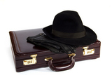 Suitcase+with+laying+from+above+a+hat+and+gloves%2C+isolated%2C+on+a+white+background
