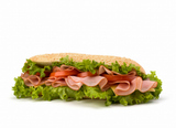 Big+appetizing++fast+food+baguette+sandwich+with+lettuce%2C+tomato%2C+smoked+ham+and+cheese+isolated+on+white+background.+Junk+food+subway.